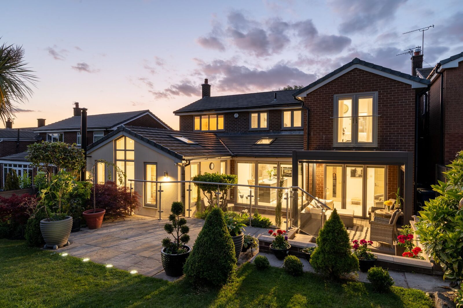 Beautiful modern UK detached home at dusk